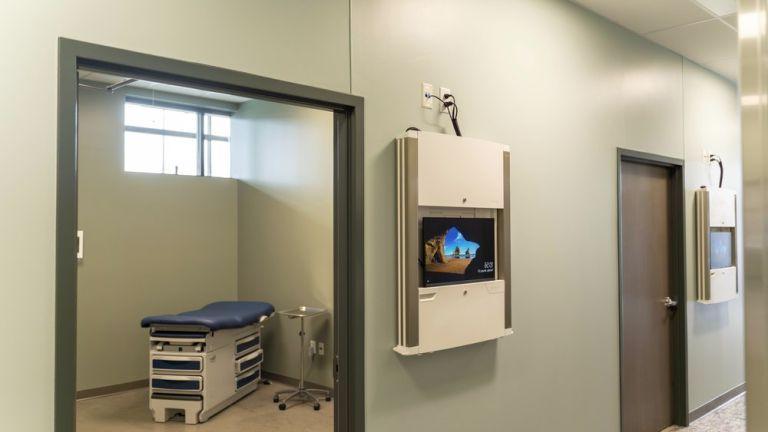 Image shows a hallway and the inside of an exam room at the CPAE.