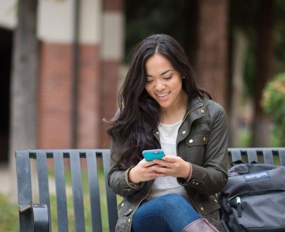 student using mobil phone