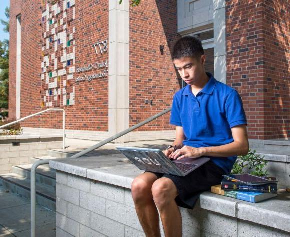 student using laptop