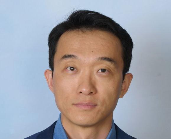 Image shows the face of UOP faculty member Dr. Long Wang.